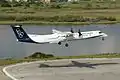 Un Dash 8-Q400 d'Olympic Air au toucher à Corfou.