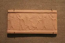 Empreinte de sceau représentant un héros affrontant un lion, et un lion affrontant un buffle. Musée de l'Institut oriental de Chicago.