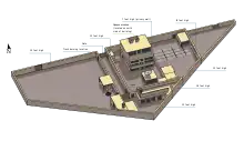 Diagram of terrorist Osama Bin Laden's compound. Contains one large three-story building and several smaller outbuildings. There are large yards on the right and left. Everything is surrounded by a high concrete wall. There are internal walls separating some courtyards for defensive purposes.