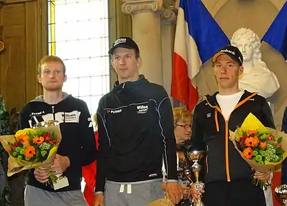 Podium de l'édition 2015 du Grand Prix de la ville de Pérenchies : Joeri Calleeuw (2e), Dimitri Claeys (1er) et Stan Godrie (3e).