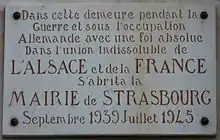 Photo d'une plaque commémorant l'installation de la mairie de Strasbourg à Périgueux de 1939 à 1945.