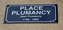 Inscription : PLACE / PLUMANCY / Jean Plumancy / 1788 - 1860, sur une des plaques de la place Plumancy, Périgueux.