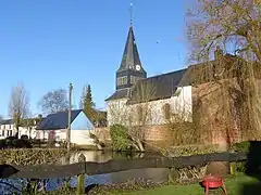 La mare et l'église Saint-Éloi.