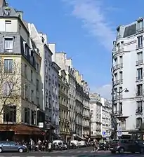La rue de Buci vue depuis le boulevard Saint-Germain, en 2012.