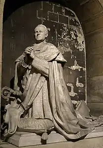 Orant de Pierre-Henri Lamazou, marbre, Paris, chapelle des Âmes-du-Purgatoire de l'église Notre-Dame-d'Auteuil.