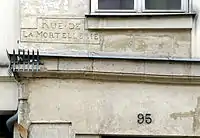 No 95, ancienne inscription : « rue de la Mortellerie ».