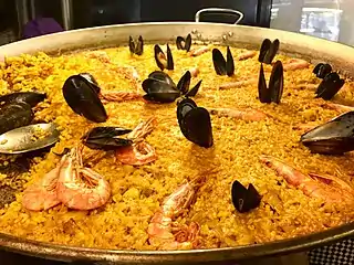 Paella aux fruits de mer→(es) Paella de marisco→(ca) Paella de marisc