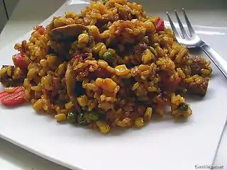 Paella végétalienne→(es) Paella de verduras→(ca) Paella de verdures