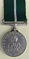 Médaille du Pakistan de 1949 portant le monogramme royal de George VI.