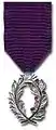 Médaille de chevalier des palmes académiques.