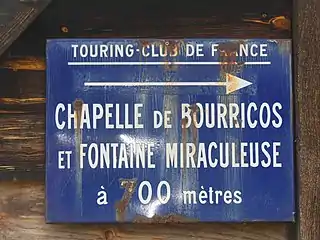 Panneau ancien du Touring club de France, où Bourricos est écrit avec deux « r »