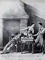 (de g. à dr.) Georges Ellie comme Iñigo, Carlotta Grisi dansant Paquita, et Lucien Petipa comme Lucien d'Hervilly dans l'acte I scène 2. Paris, 1844