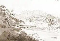 Croquis représentant une vallée boisée avec des cavaliers et des bêtes de somme sur une route sur le côté gauche descendant vers un pont couvert traversant une rivière.