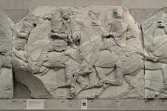 Plaque de frise : trois chevaux et cavaliers
