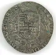 Revers d'un patagon aux armes d'Albert VII (1600-1621).