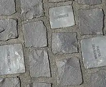 Pavés lumineux avec messages de bienvenue, à Genève.