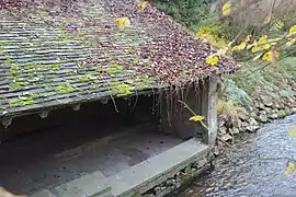 Le lavoir du hameau de la Planche.