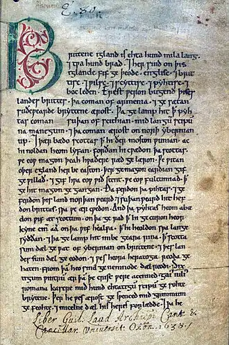 Page manuscrite rédigée à l'encre noire commençant par une grande lettre B rouge et verte