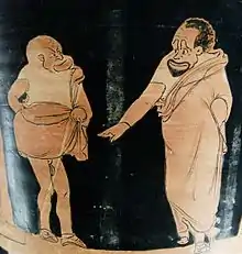 Scène de pièce de phlyax : maître (à droite) et esclave (à gauche), cratère en calice à figures rouges de Sicile, v. 350-340 av. J.-C. Musée du Louvre.