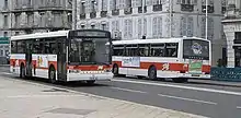 Photographie en couleurs représentant un bus.