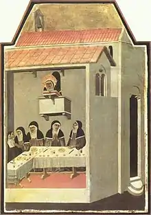 Nonnes dînant en silence, tout en écoutant la lecture de la Bible (Humilité, Pietro Lorenzetti, 1341).