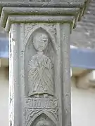 Saint André avec sa croix.