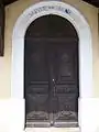 Porte sculptée de l’église de Plan-du-Var.