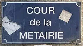 Voir la plaque.