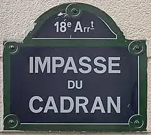 Voir la plaque.