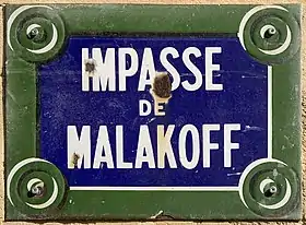 Voir la plaque.