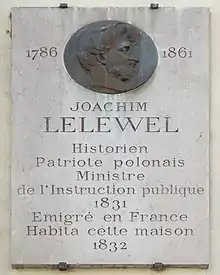 Plaque au no 153.