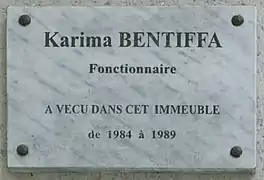 Plaque sur la façade du 9, rue Pérignon.