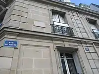 Plaque commémorative d'Auguste Chapuis au no 38, rue de Prony.