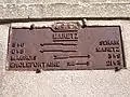 Plaque de clocher sur un mur d'habitation, rue Eugène Lefebvre.