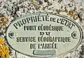 Plaque signalétique au pied de la cheminée de Plagnole (Haute-Garonne).