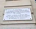 la plaque sur le portail des manèges