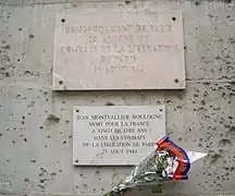 Plaque commémorative au 60 boulevard Saint-Michel à Paris.