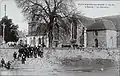 L'église, le calvaire et le cimetière de Plounévez-Quintin au début du XXe siècle (carte postale).