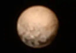Photographie de Pluton en vraies couleurs prise par New Horizons, le 3 juillet.
