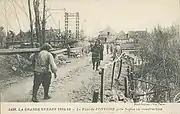 Le pont sur l'Oise en reconstruction vers 1920.