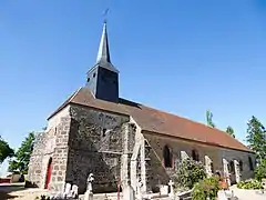 Portail ouest, mur sud et cimetière.