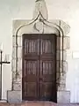 Porte d'une maison d'Aixe-sur-Vienne, exposée au musée des Cloîtres à New York.