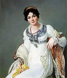 Peinture. Portrait d'une jeune femme brune assise en robe empire blanche