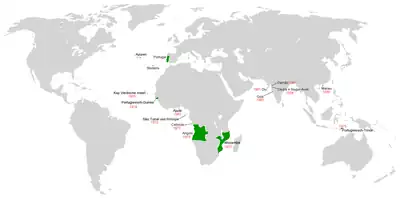 Planisphère euro-centré représentant le Portugal et ses colonies au début du vingtième siècle, soit les huit provinces ultramarines et le Fort Saint-Jean-Baptiste-d'Ajuda dans l'actuel Bénin.