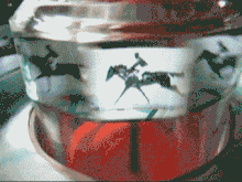 Reconstitution d'un praxinoscope à partir d'un pot de confiture Mitra.