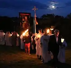 Procession aux flambeaux.