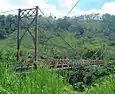 Puente colgante sobre el río Peñas Blancas