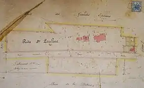 Plan de masse ancien où les bâtiments sont indiqués par des rectangles rouges.