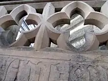 Quadrilobe du parapet des tours de la collégiale de Neuchâtel.