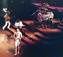 Queen, en concert en 1984, qui emprunta le titre d'une chanson à Browning.